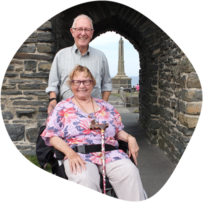 Happy couple, one in a wheelchair