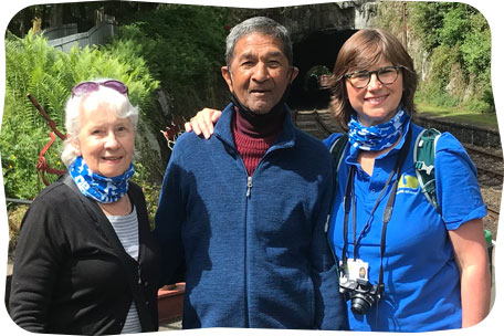 Two holiday makers and Dementia Adventure team member