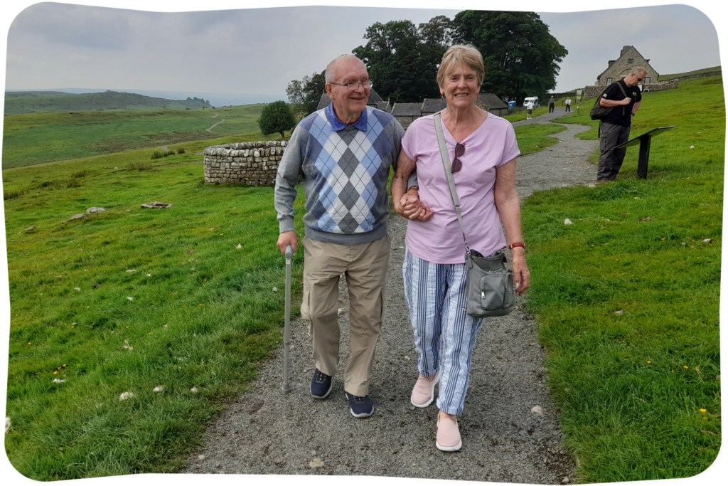 Couple walking near Hadrian's Wall.